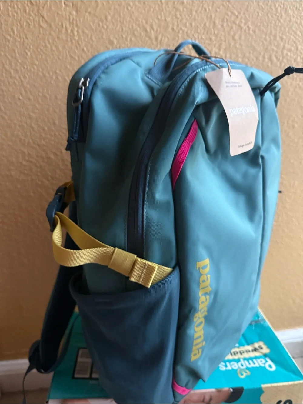 Patagonia Teal and Pink Men's Backpack with Yellow Logo Accent